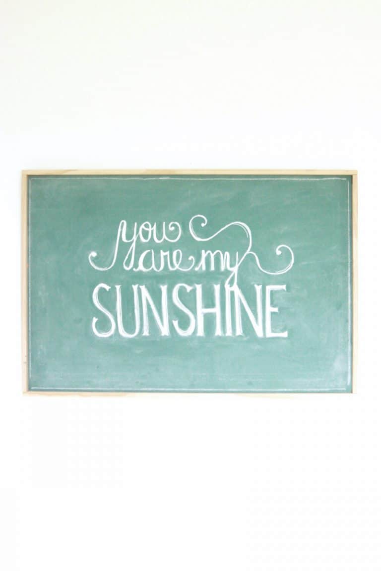 a vintage green chalkboard that says you are my sunshine