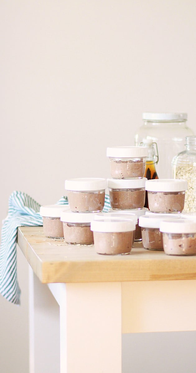 a stack of mason jars full of homemade snacks