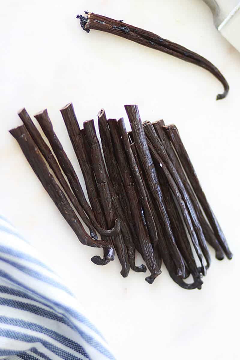 a pile of halved vanilla beans