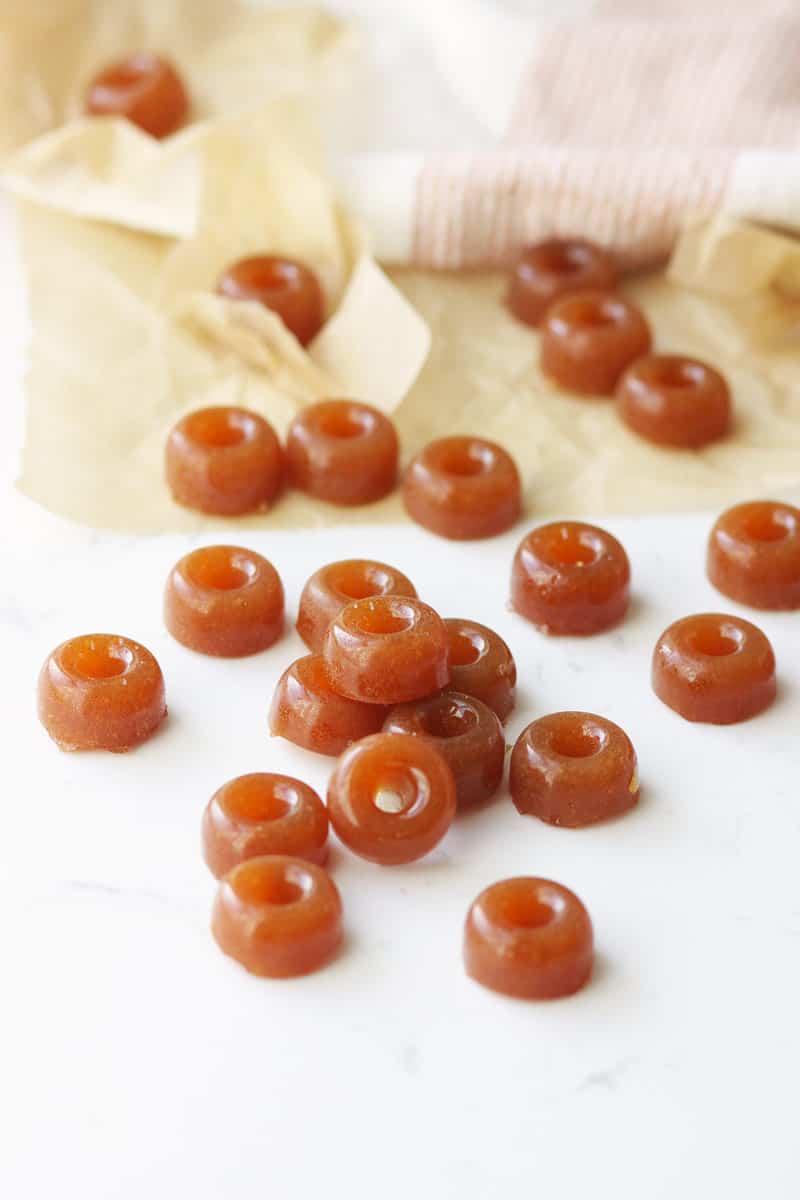 ginger hard candies laying on parchment paper